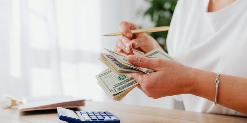 Person, calculator, money